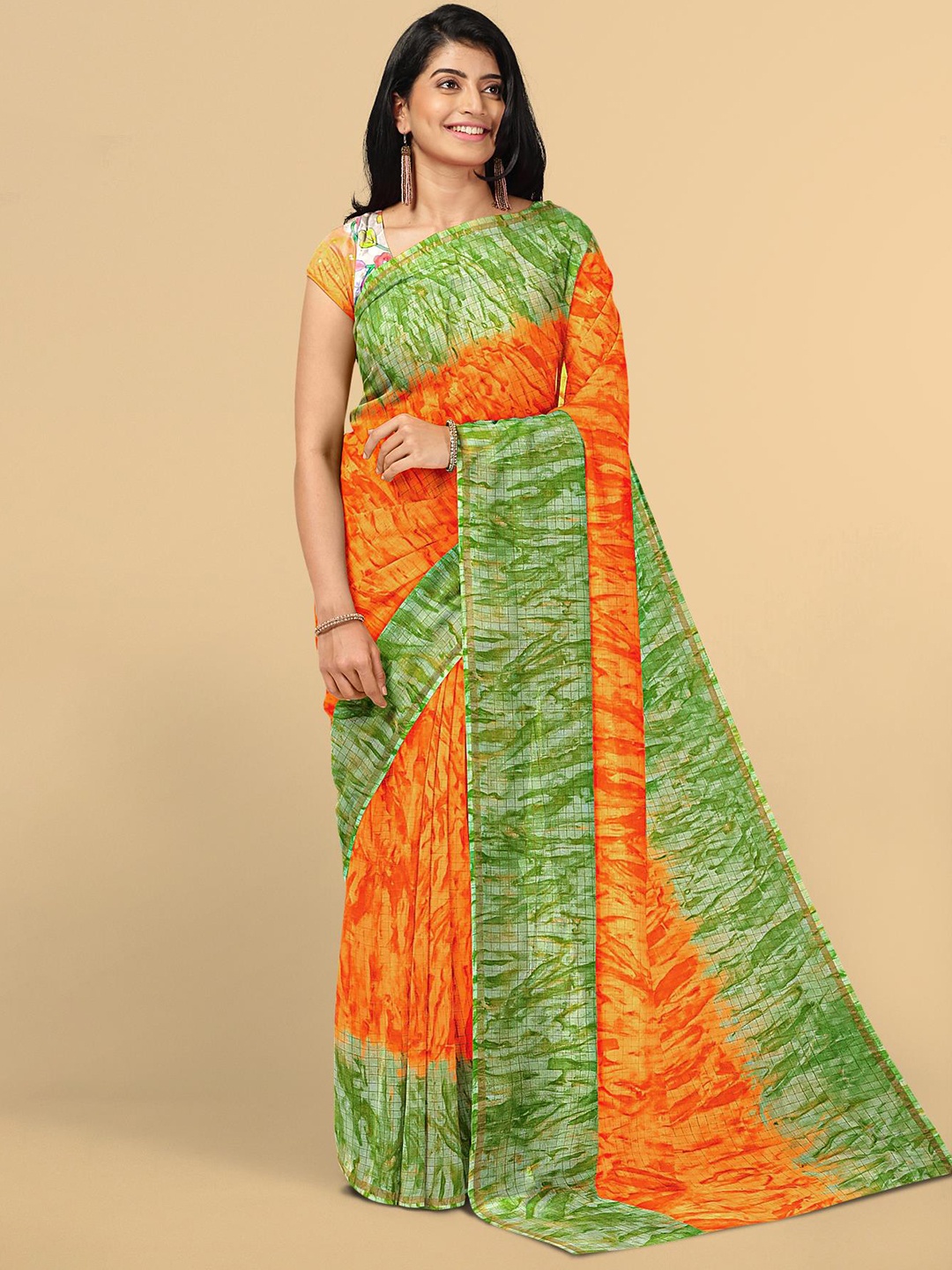 

Kalamandir Orange & Green Jute Cotton Saree
