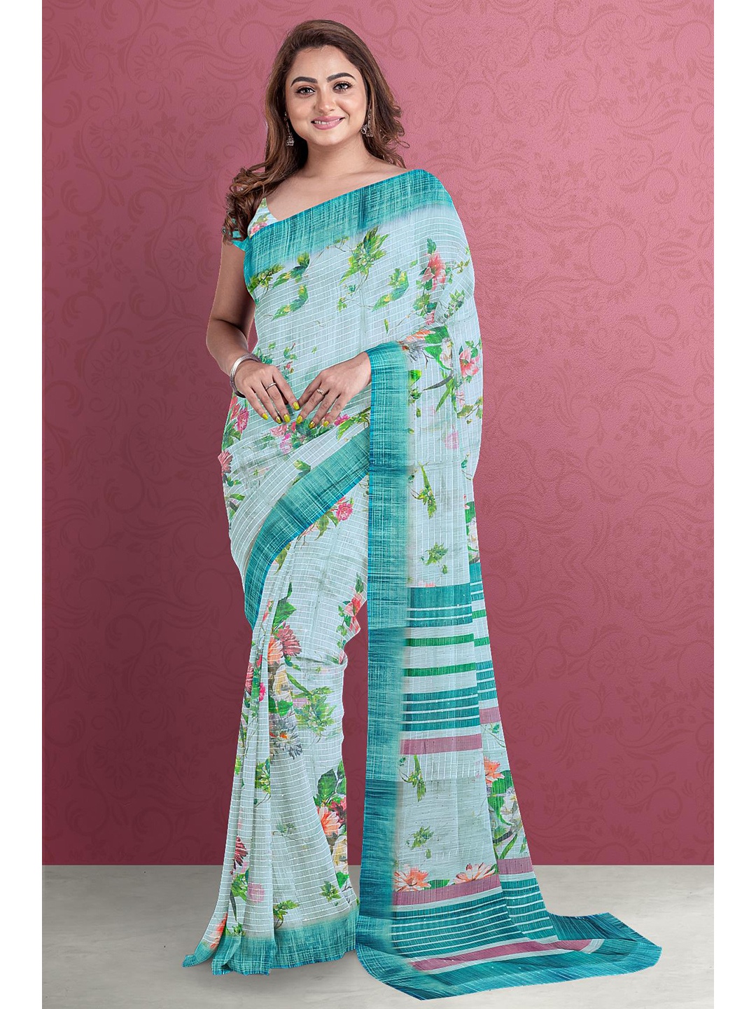 

Kalamandir Blue & Green Floral Jute Silk Saree