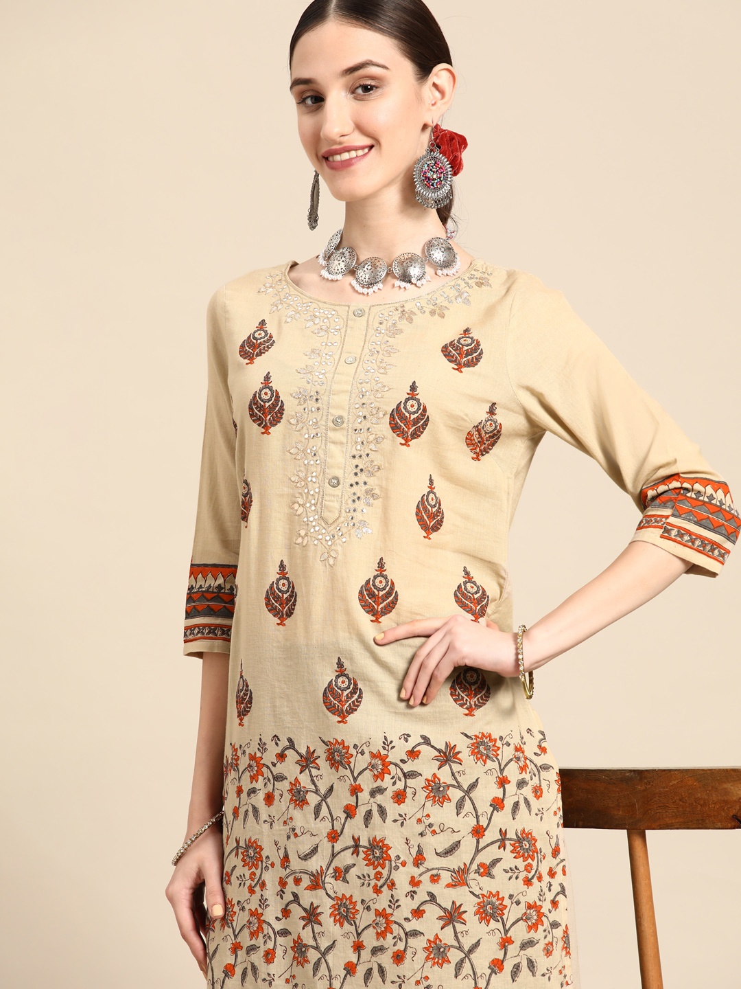 

Sangria Women Beige Floral Embroidered Mirror Work Kurta