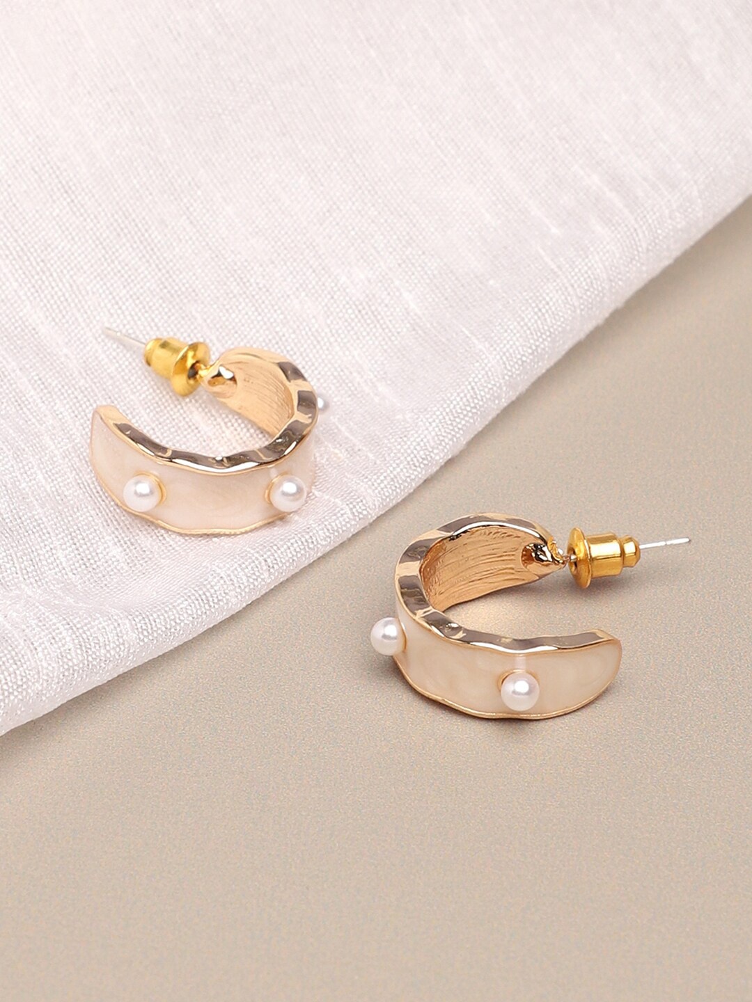 

SOHI Women Gold-Toned & White Contemporary Half Hoop Earrings