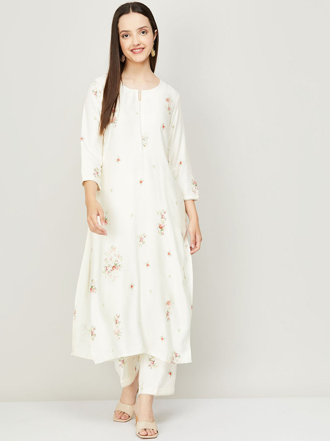 

Melange by Lifestyle Women Off White Floral Printed Kurta with Trousers