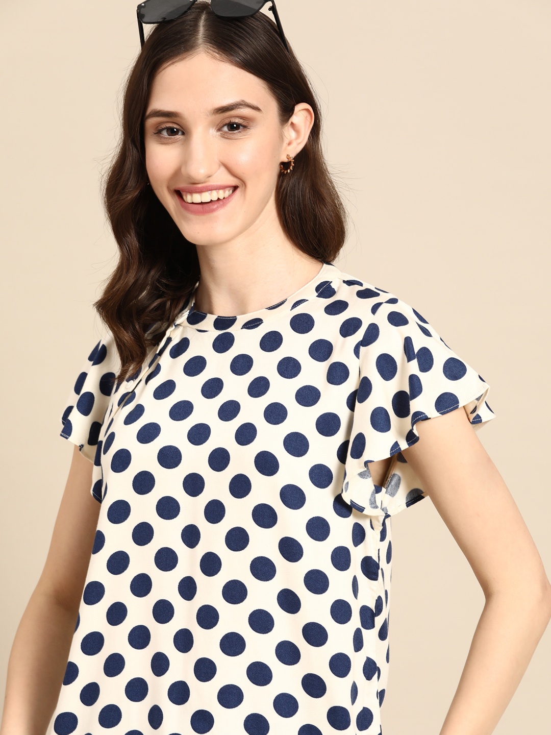 

United Colors of Benetton Off White & Navy Blue Polka Dots Print Top