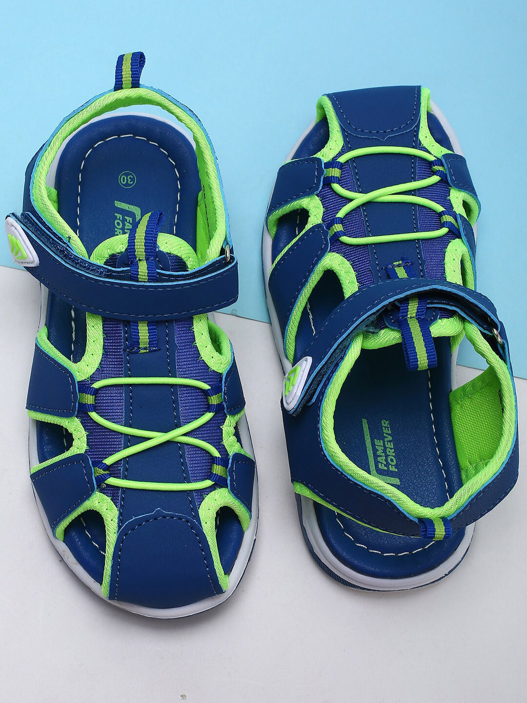

Fame Forever by Lifestyle Boys Navy Blue & Fluorescent Green Fisherman Sandals