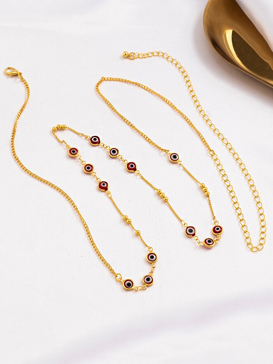 

Unwind by Yellow Chimes Gold Plated Evil Eye Design Waist Chain