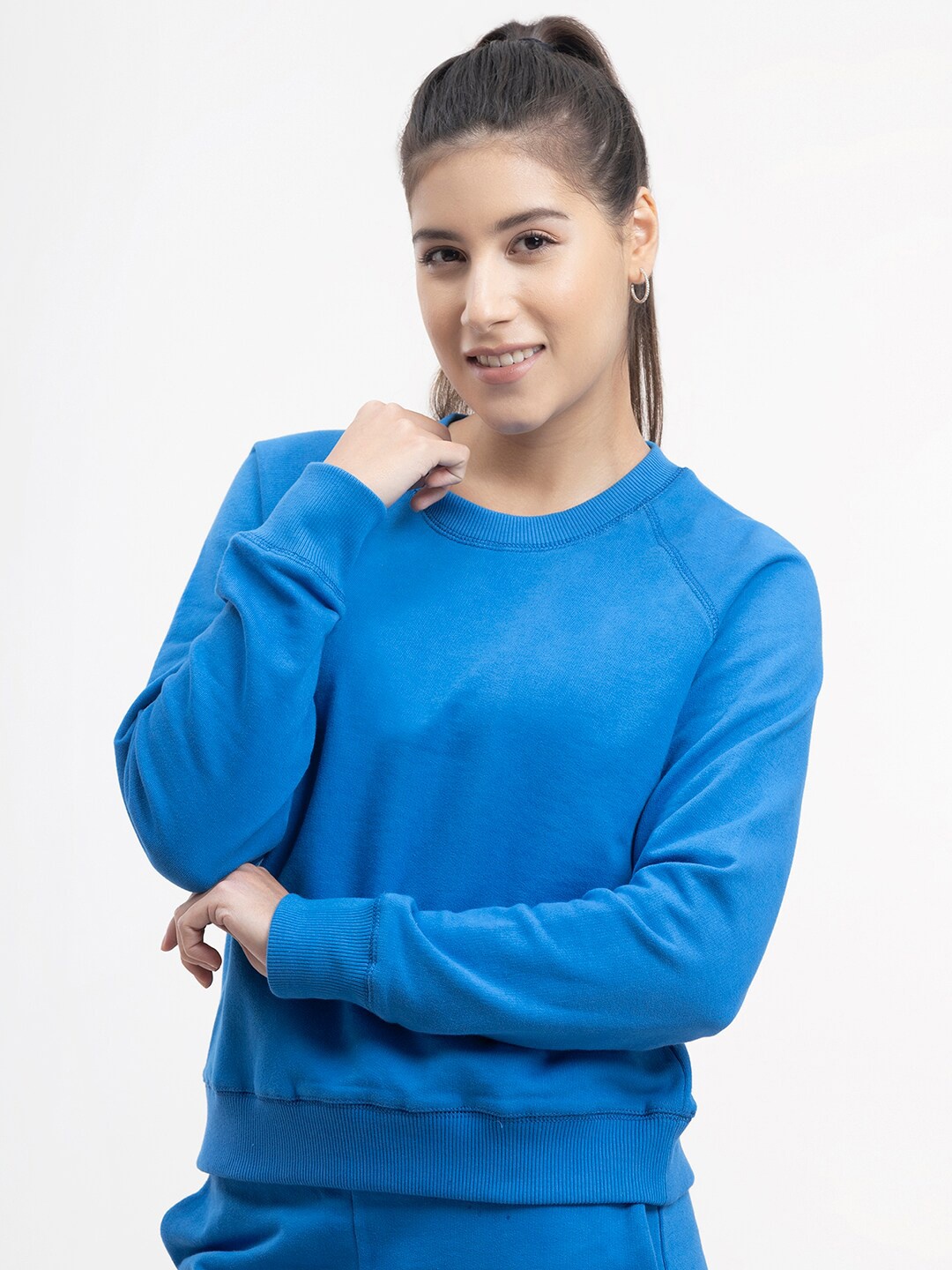 

FableStreet Women Blue Solid Sweatshirt