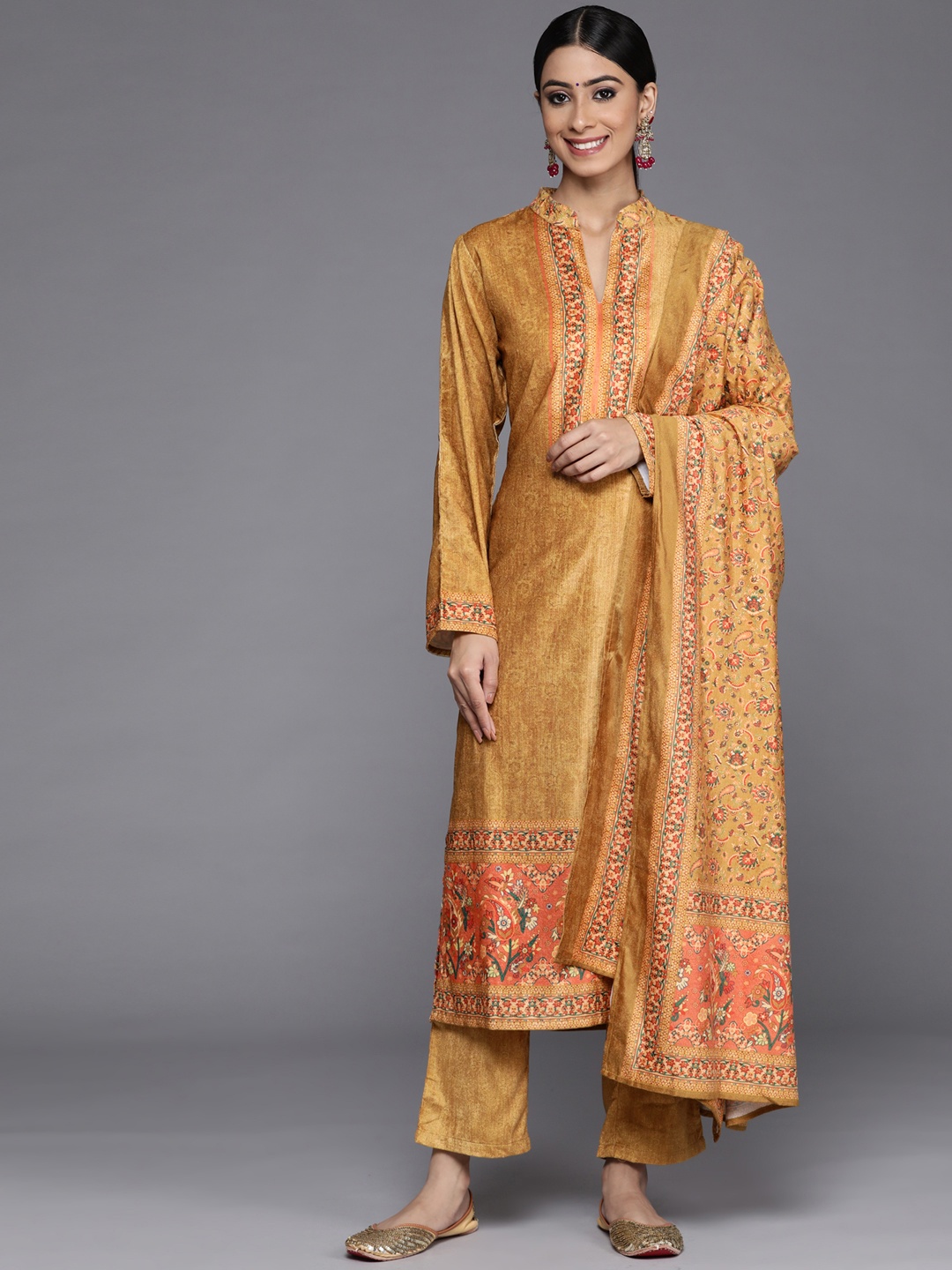 

Libas Women Mustard Yellow Ethnic Motifs Printed Velvet Kurta with Trousers & With Dupatta