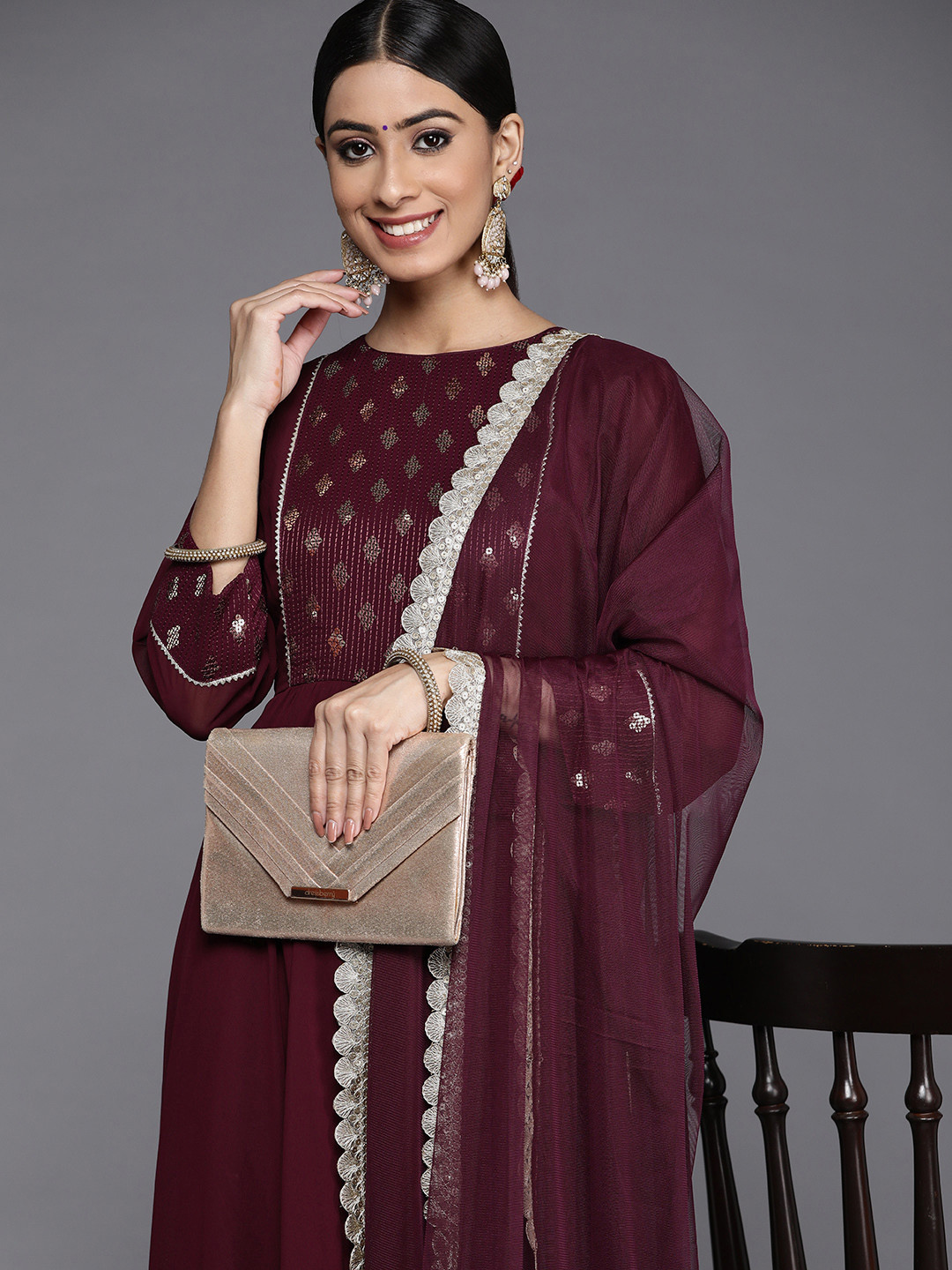 

Libas Women Burgundy Yoke Design Sequinned Kurta with Churidar & With Dupatta