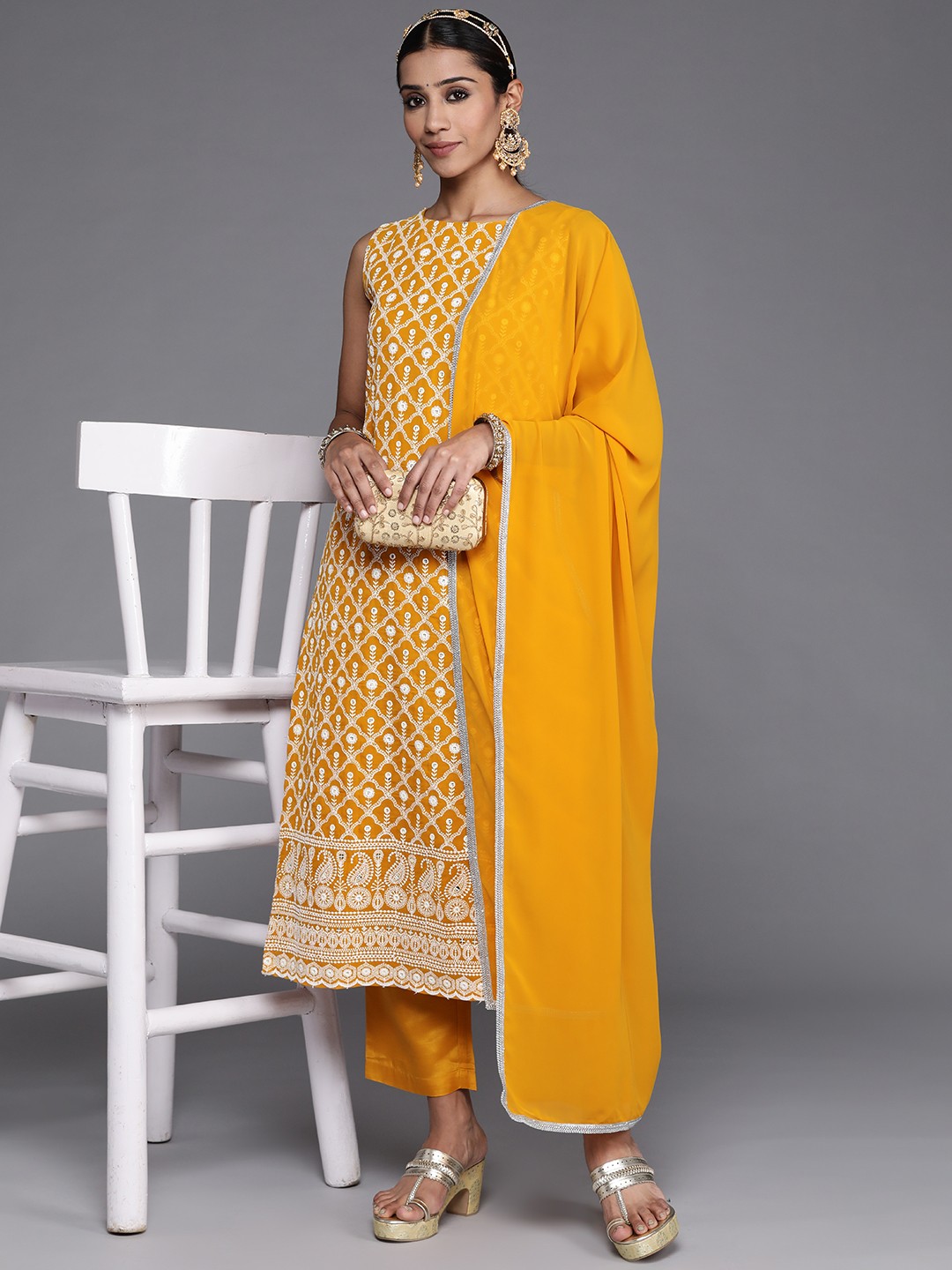 

Libas Women Mustard Floral Embroidered Thread Work Kurta with Trousers & With Dupatta