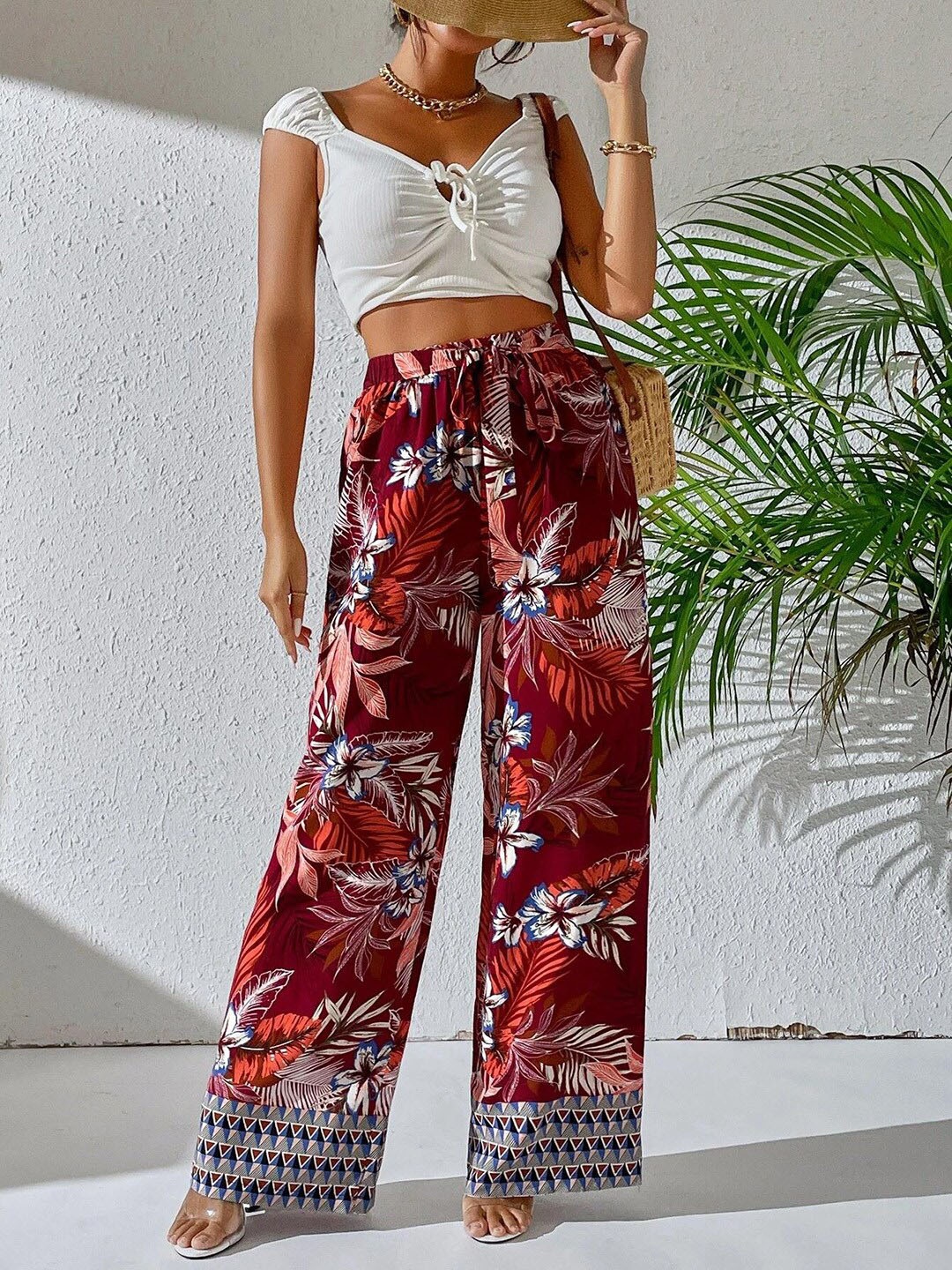 

Kotty Women Maroon Floral Printed Relaxed Straight Fit High-Rise Easy Wash Trousers