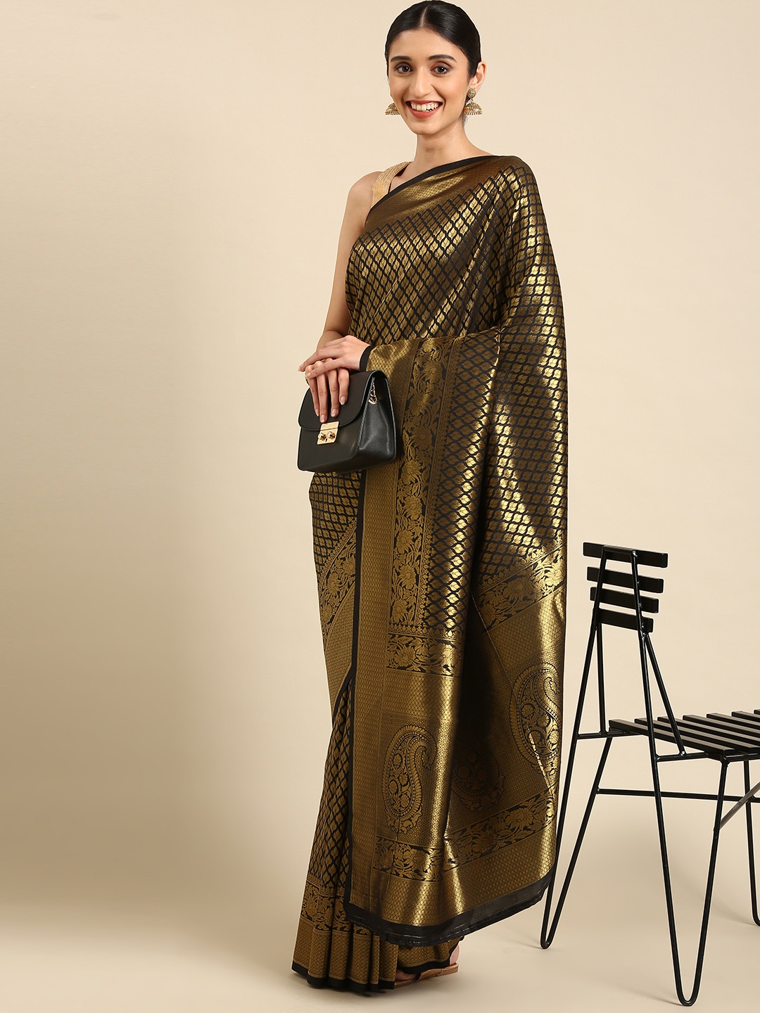 

SHARAA ETHNICA Black & Golden Woven Design Pure Silk Kanjeevaram Saree