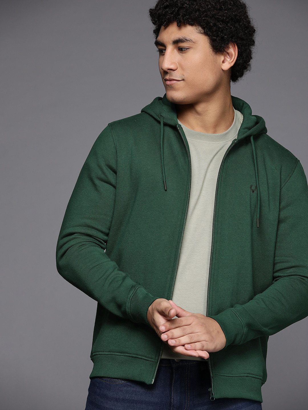 

Allen Solly Sport Men Green Solid Hooded Sweatshirt