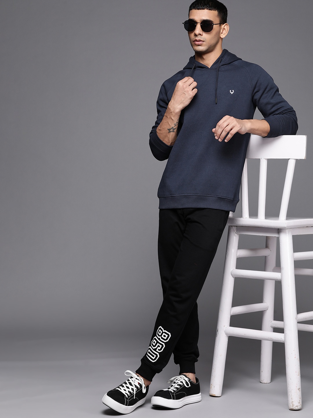 

Allen Solly Sport Men Navy Blue Solid Hooded Sweatshirt