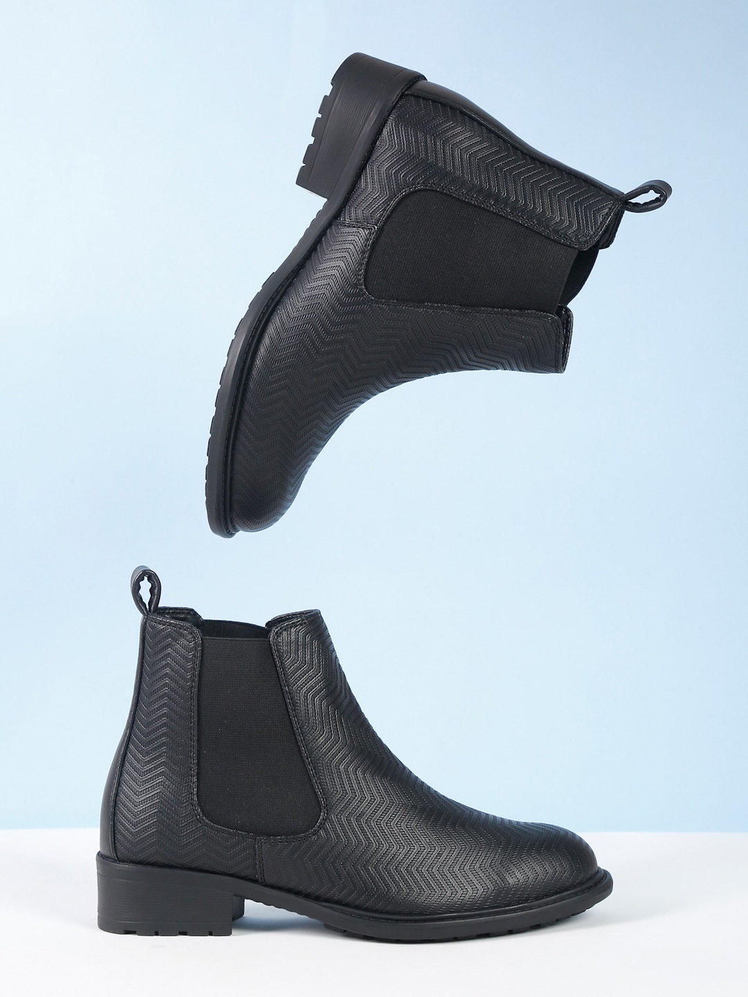 

Roadster Women Black Textured Cheslea Boots
