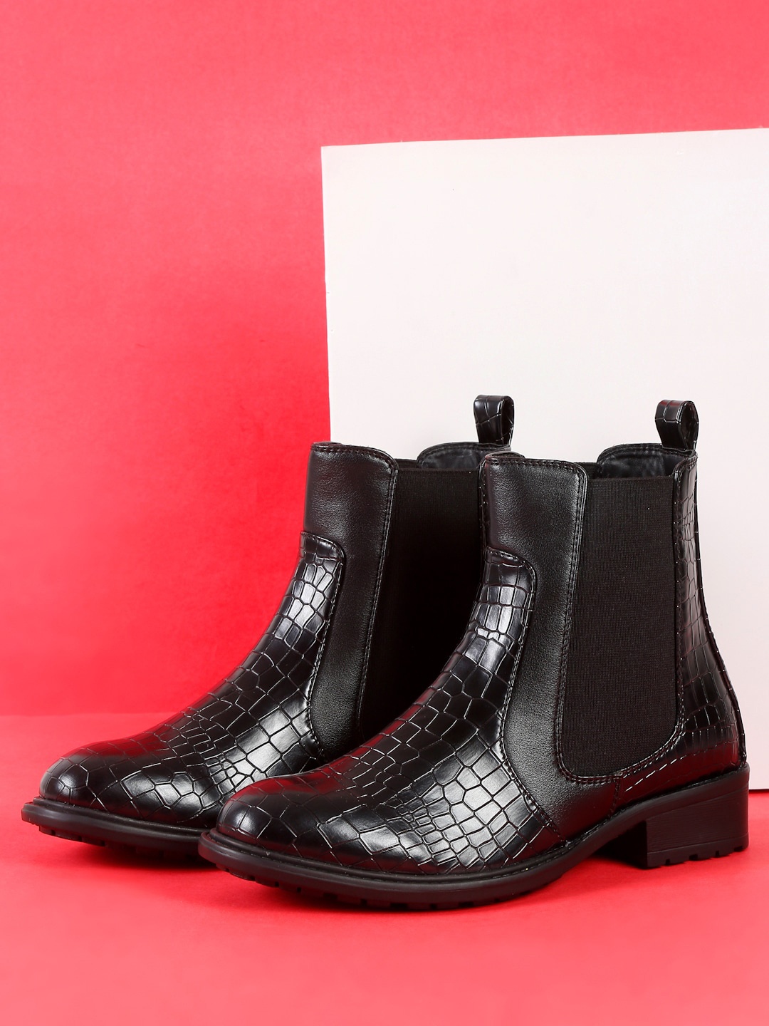 

Roadster Women Black Textured PU Chelsea Boots