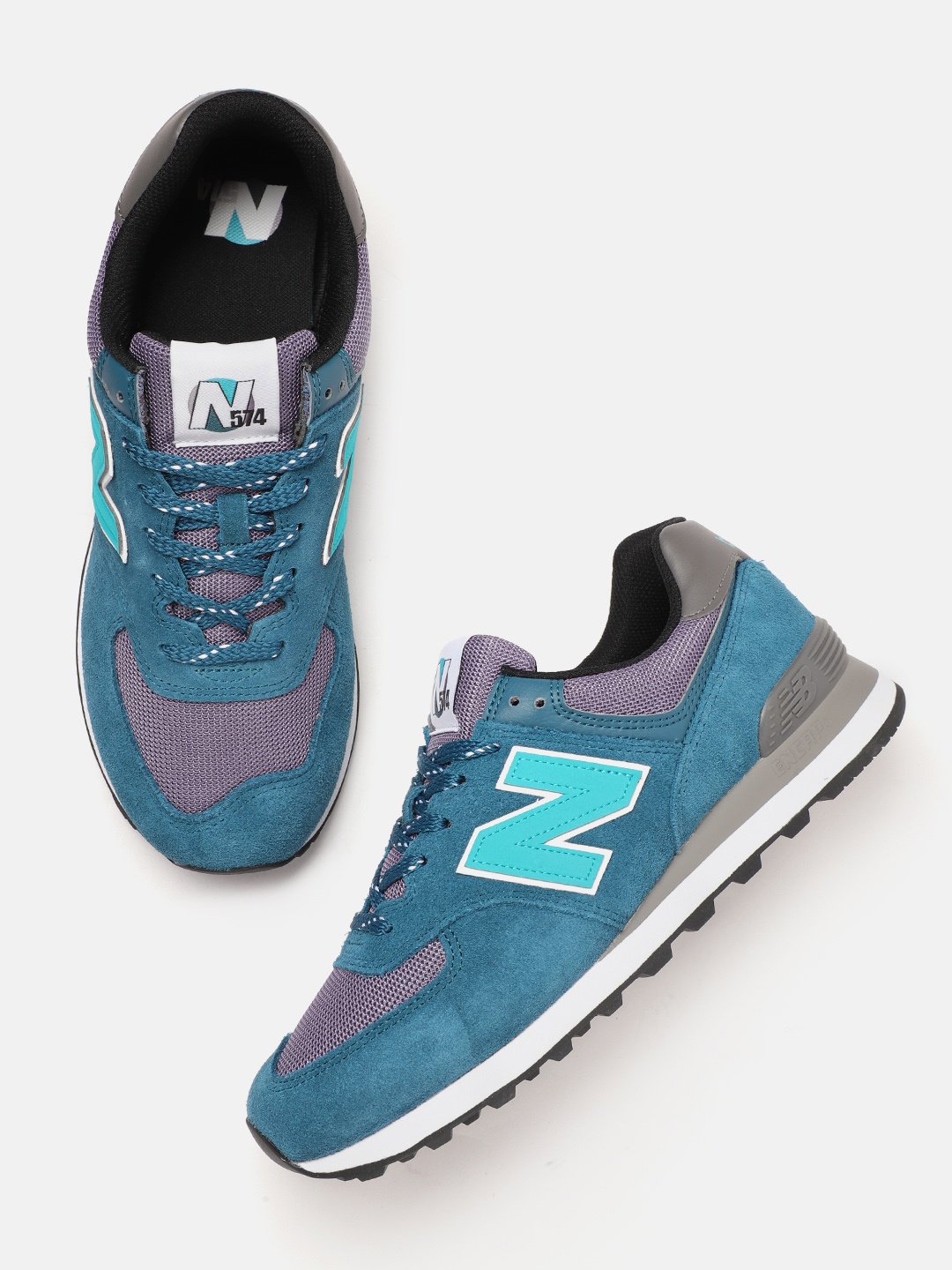 

New Balance Men Woven Design & Colourblocked Suede 574 Sports Shoes, Blue