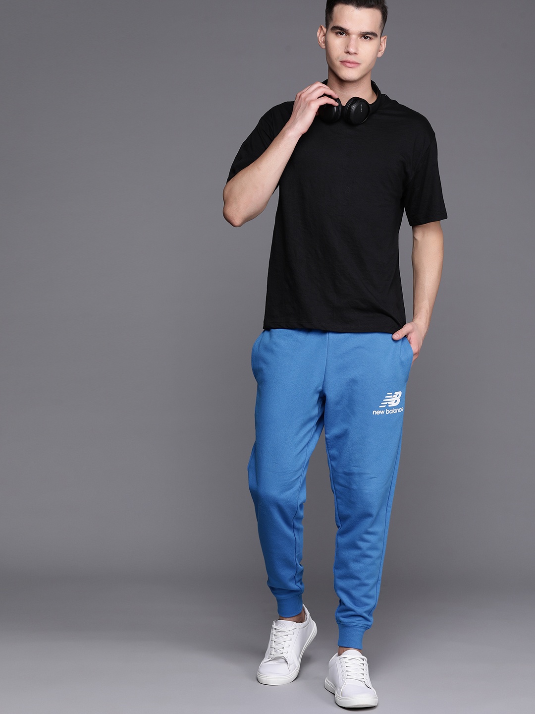 

New Balance Men Brand Logo Print Detail Regular Fit Joggers, Blue