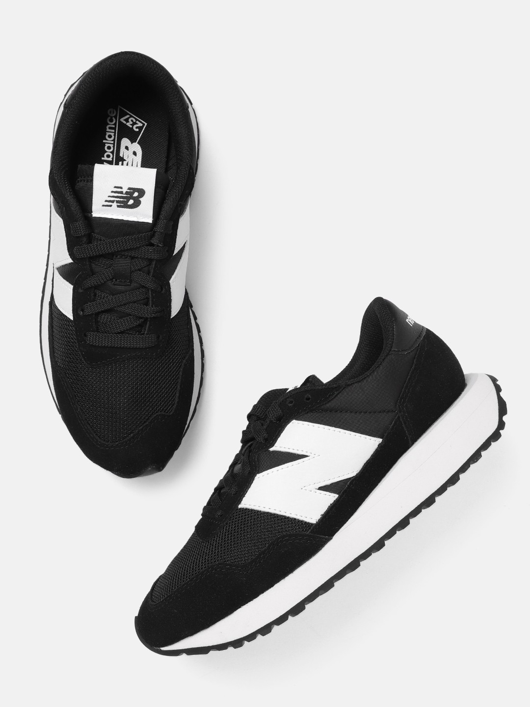

New Balance Women Woven Design Suede Sneakers, Black