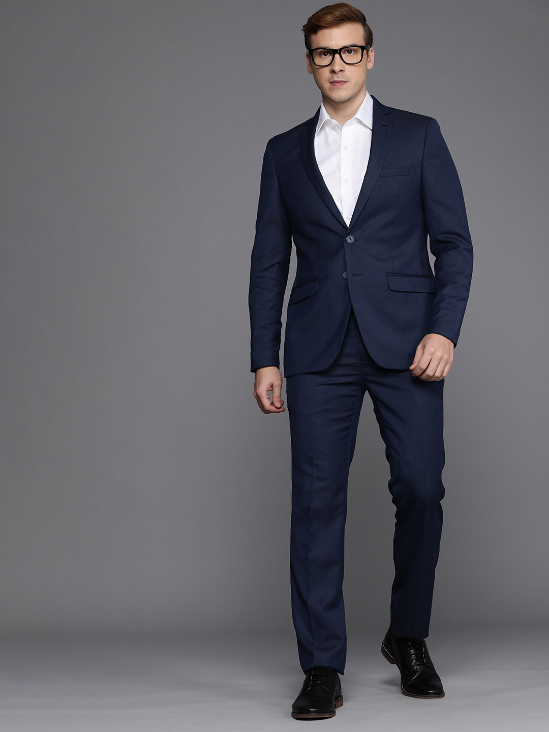 

Raymond Men Blue Solid Slim Fit Single-Breasted Two Piece Formal Suit