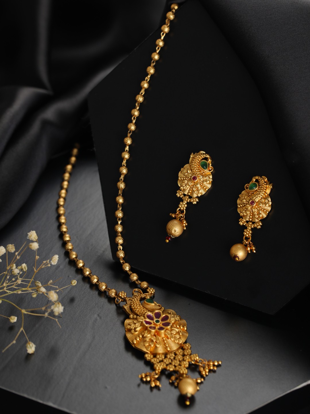 

Priyaasi Floral Peacock Studded Gold-Plated Jewellery Set