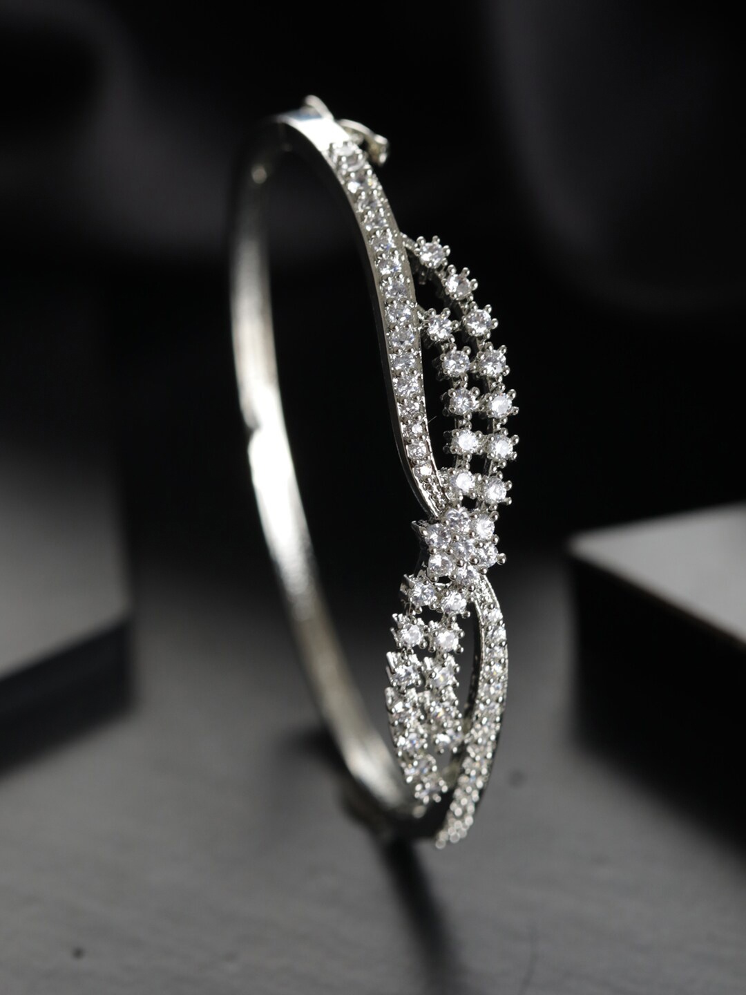 

Priyaasi Women Silver-Plated White American Diamond Bangle-Style Bracelet