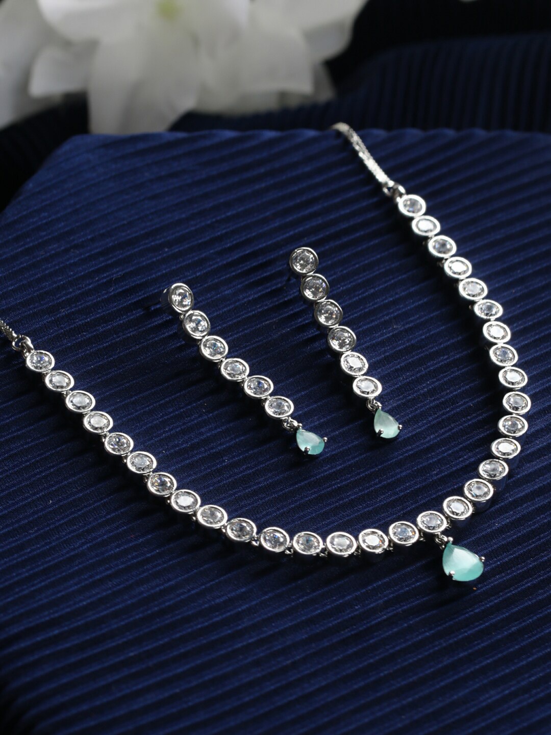 

Priyaasi Women Silver-Plated & Green AD Studded Jewellery Set