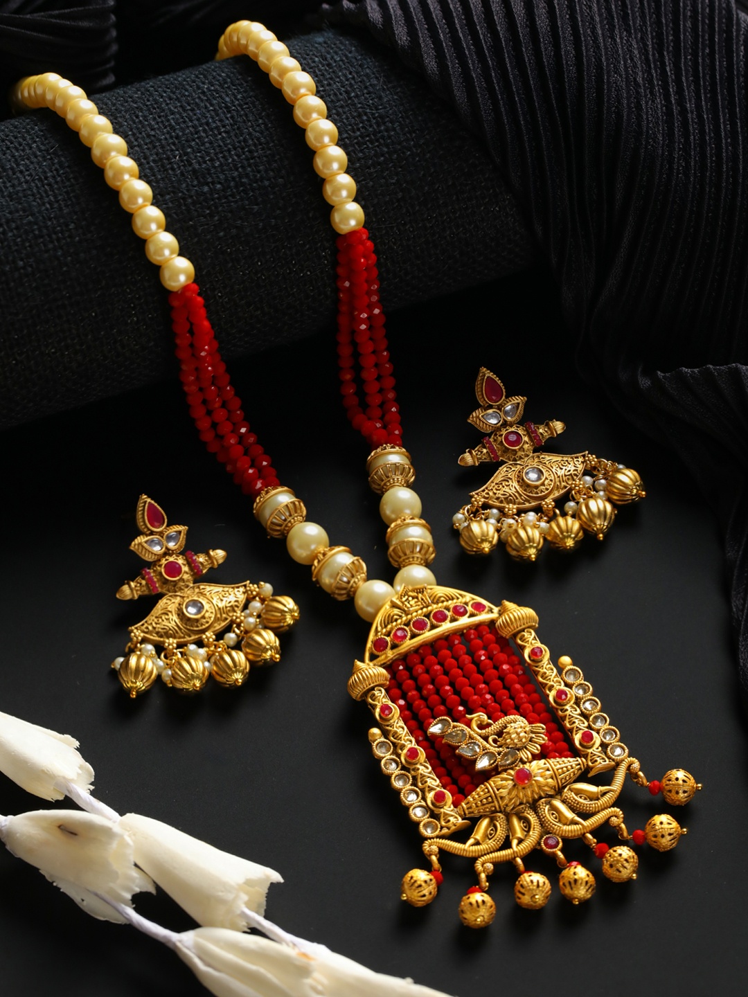 

Priyaasi Women Gold-Plated White & Red Stone Studded & Pearl Beaded Jewellery Set