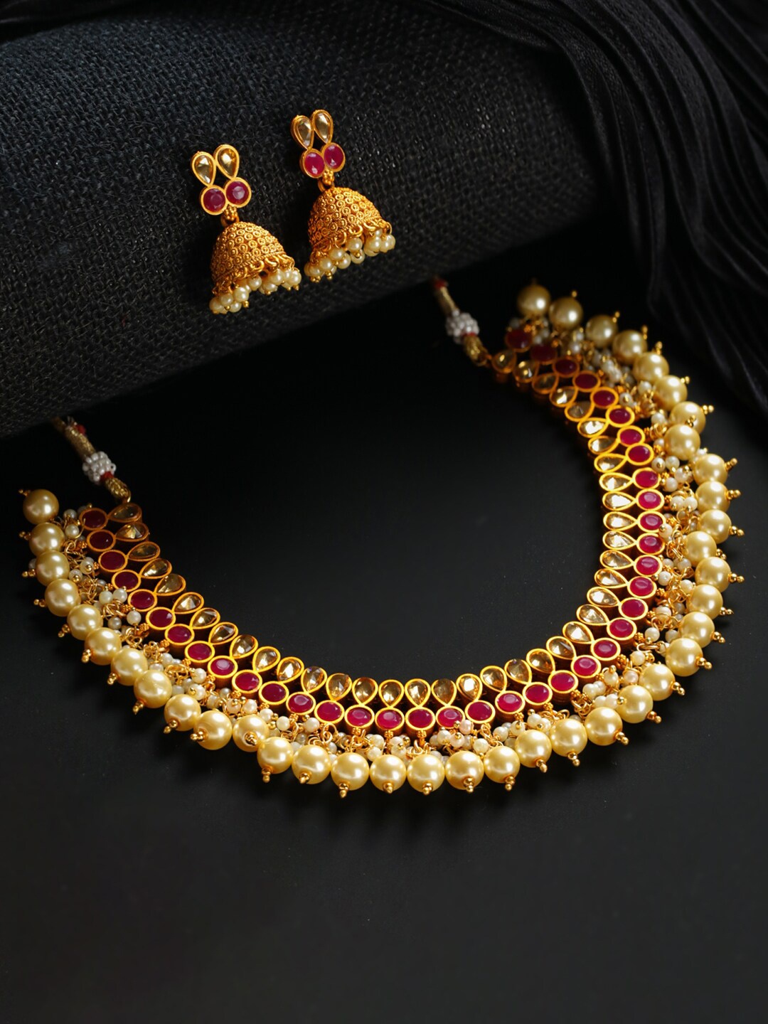 

Priyaasi Gold-Plated White & Pink Stone-Studded & Pearl Beaded Jewellery Set