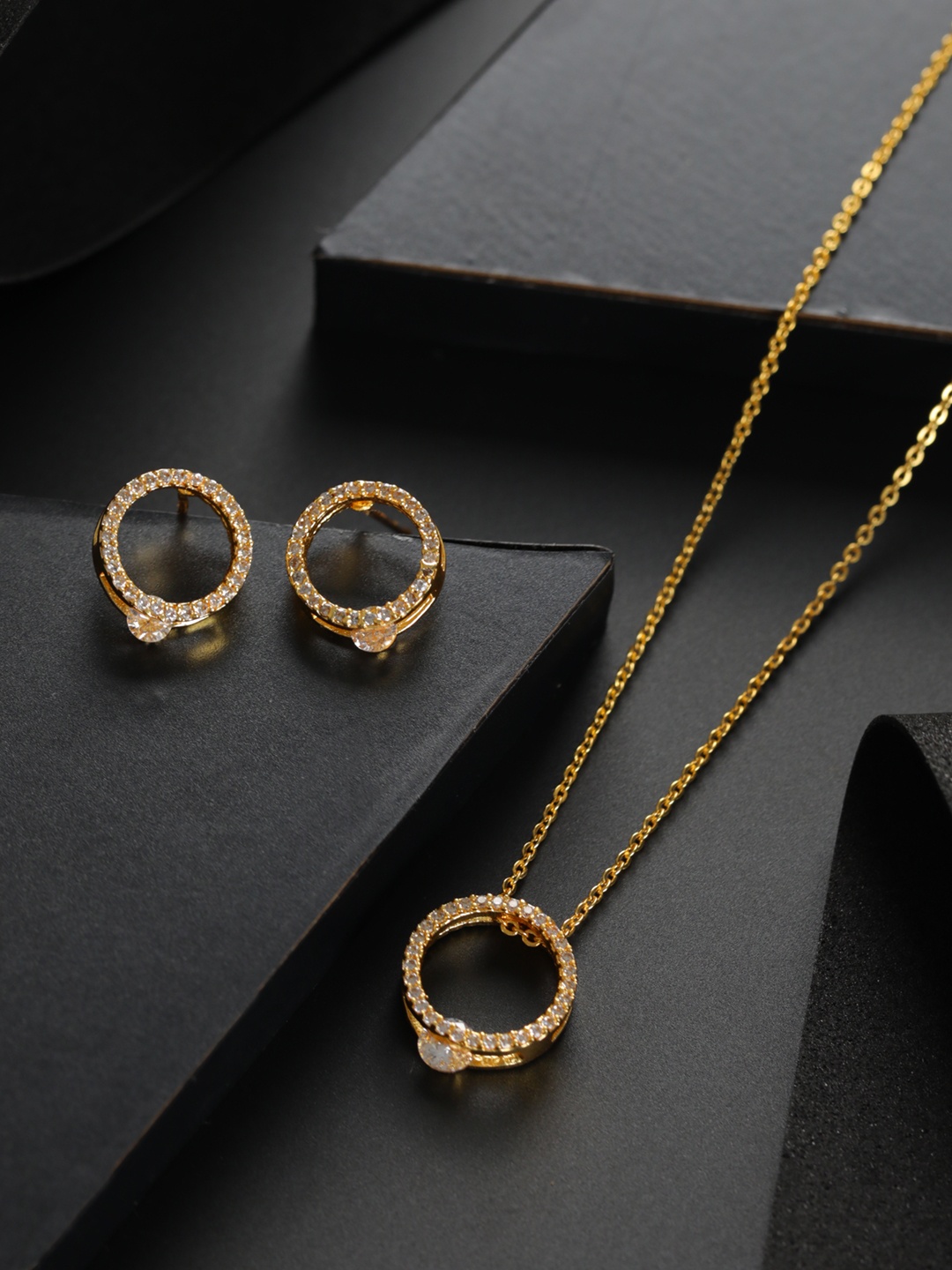 

Priyaasi Gold-Plated Elegant AD Studded Jewellery Set