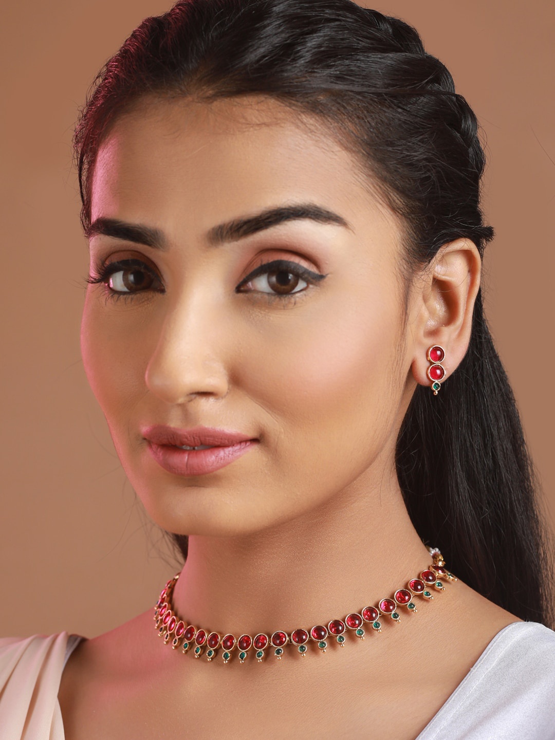 

Priyaasi Gold-Plated Round Red & Green Stones Studded Jewellery Set