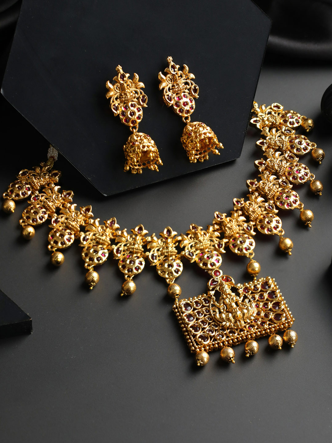 

Priyaasi Gold-Plated & Pink Artificial Stones Studded Jewellery Set