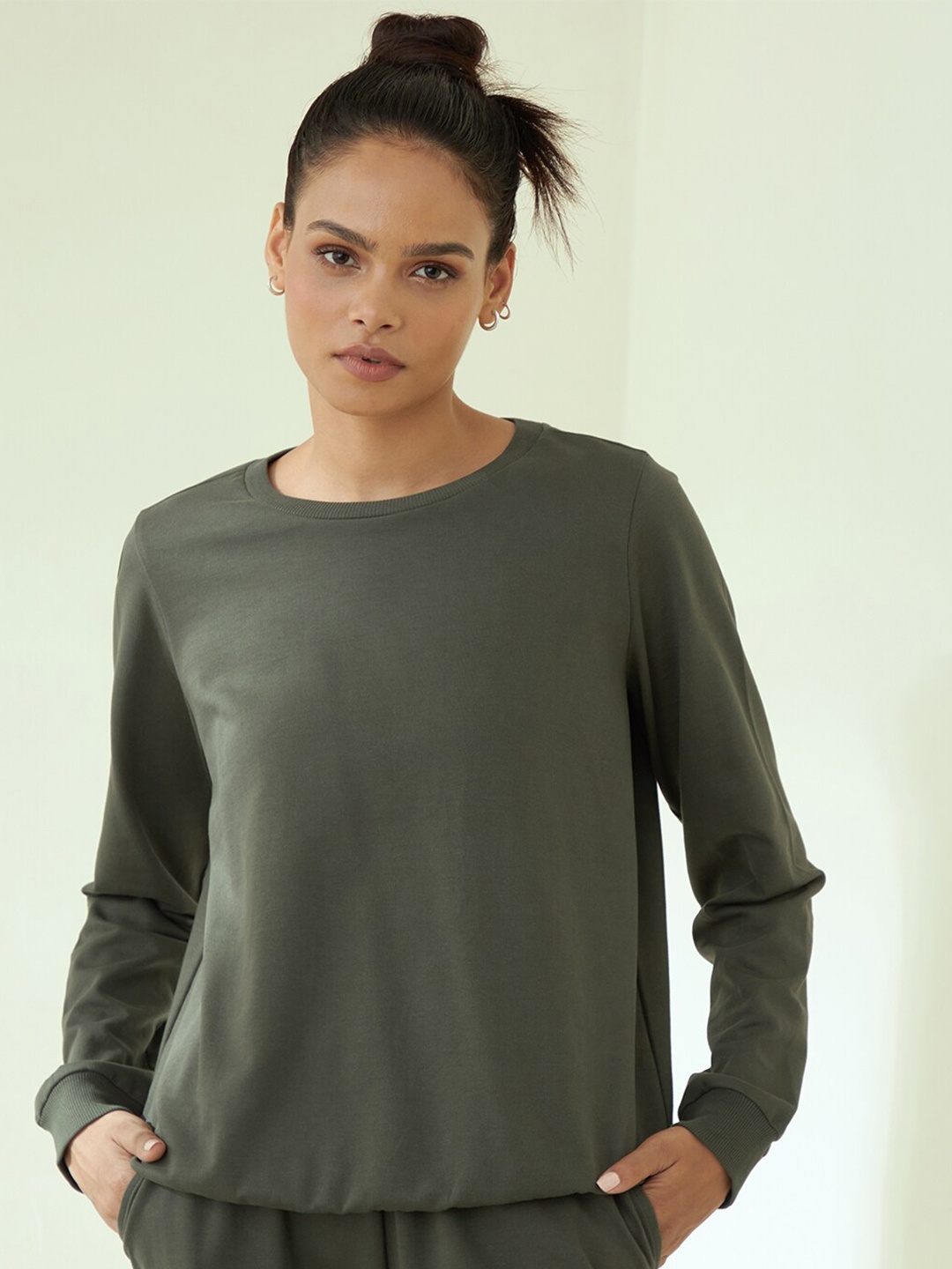 

Femella Women Olive Green Cotton Solid Sweatshirt