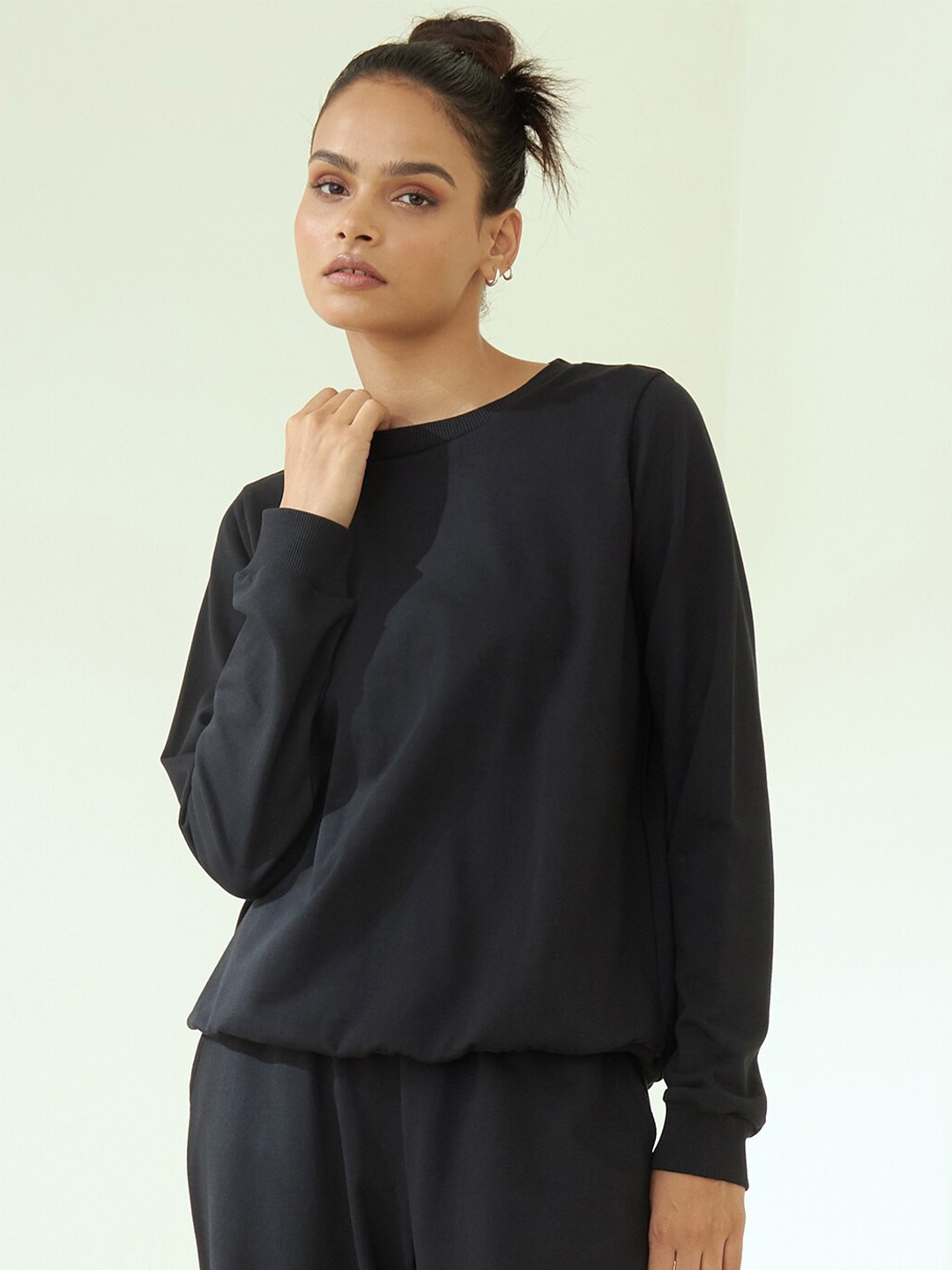 

Femella Women Black Cotton Solid Sweatshirt