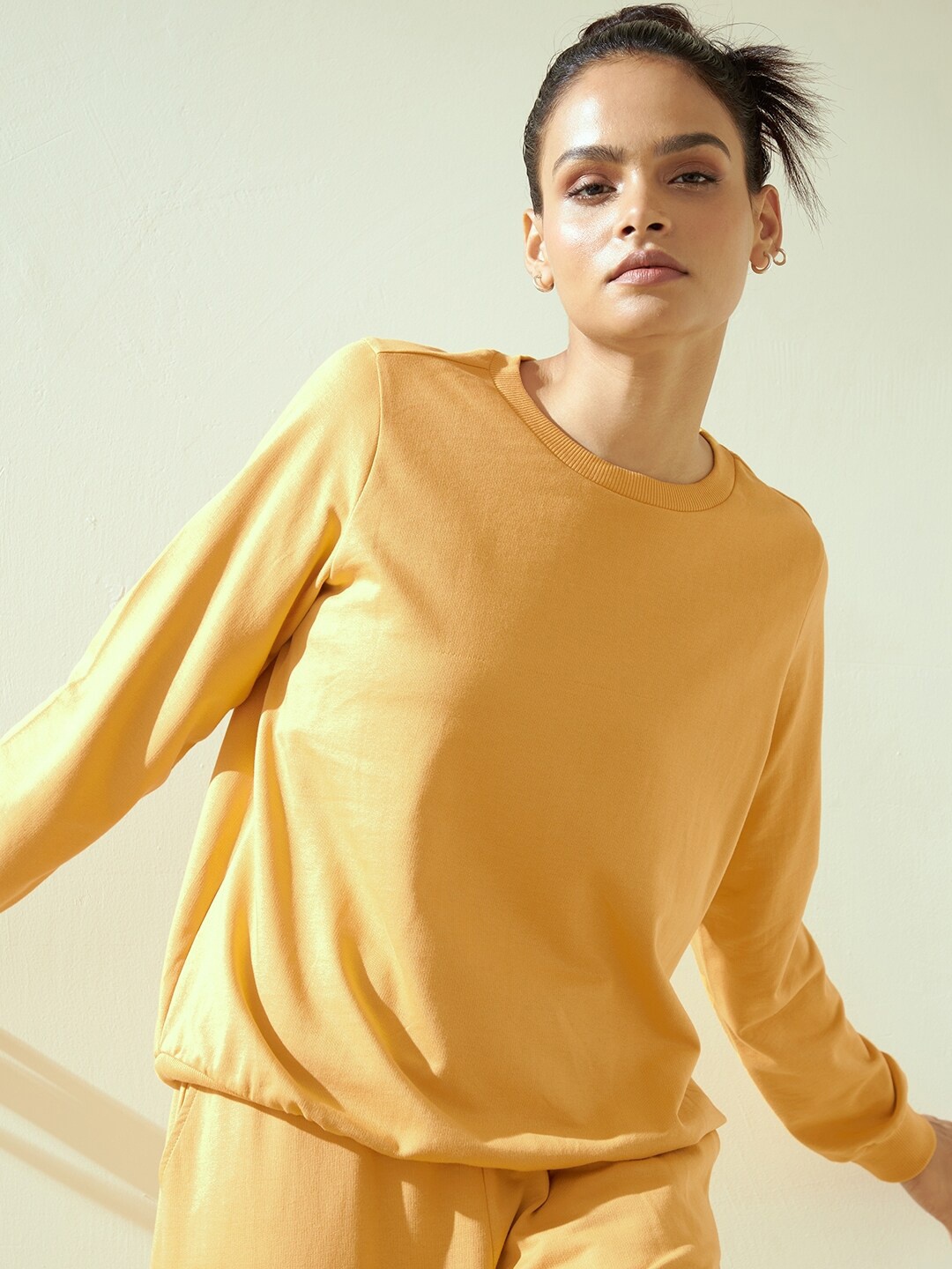 

Femella Women Yellow Cotton Solid Sweatshirt