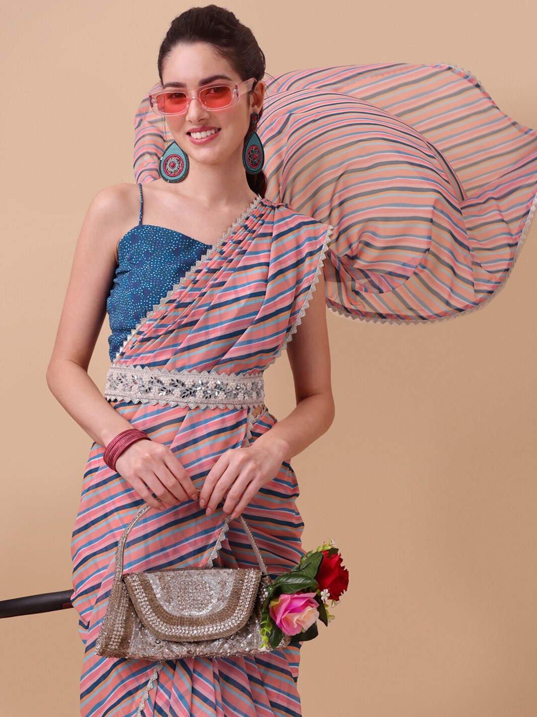 

Inddus Pink & Blue Striped Saree