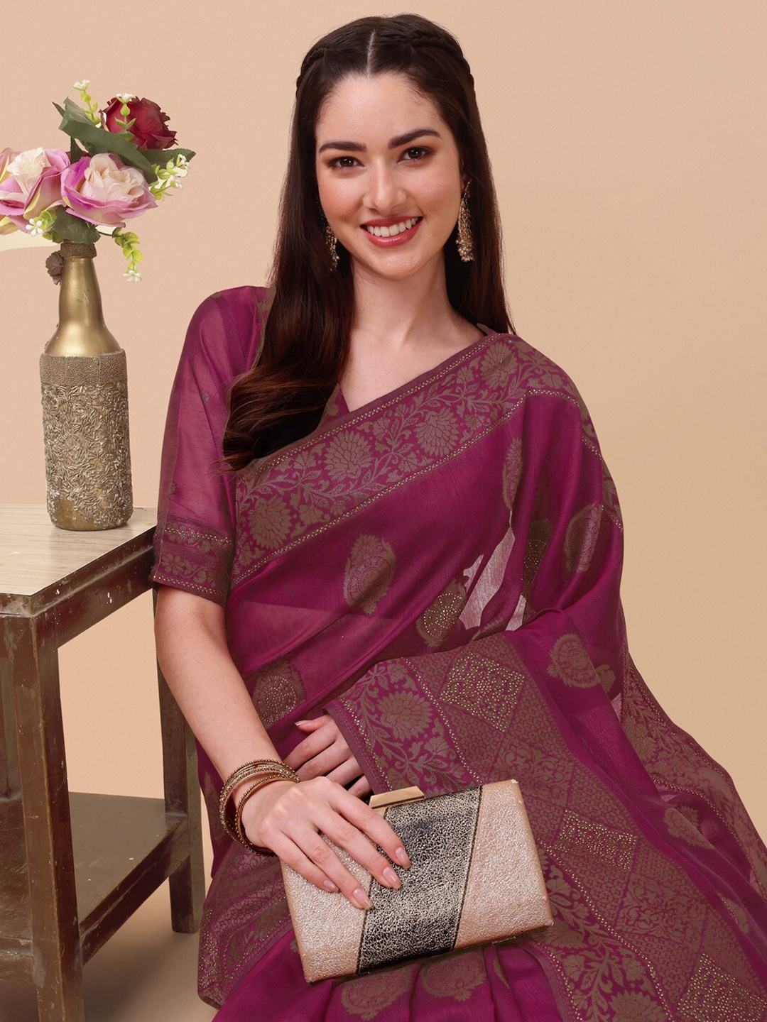

Inddus Magenta & Gold-Toned Ethnic Motifs Saree