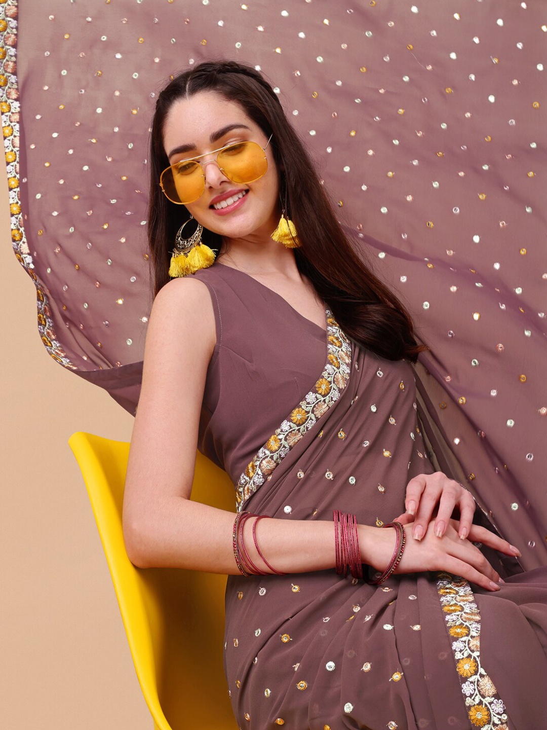 

Inddus Mauve & Yellow Ethnic Motifs Embroidered Saree