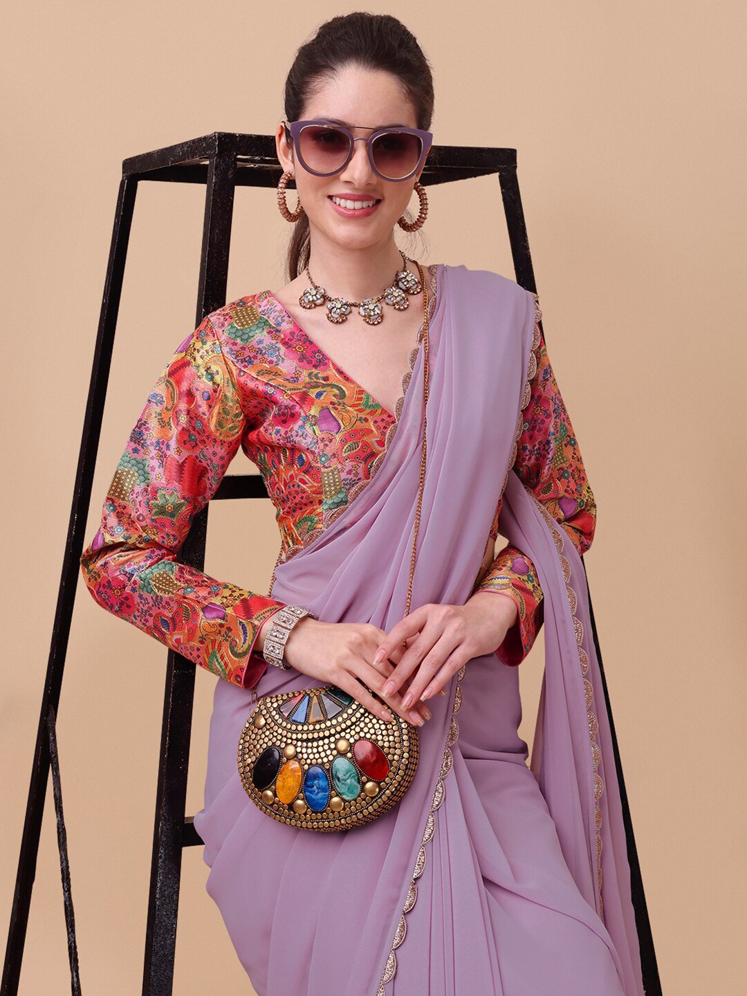 

Inddus Lavender & Gold-Toned Embroidered Saree