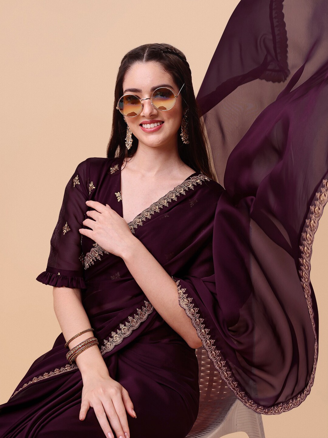 

Inddus Mauve & Gold-Toned Embroidered Saree