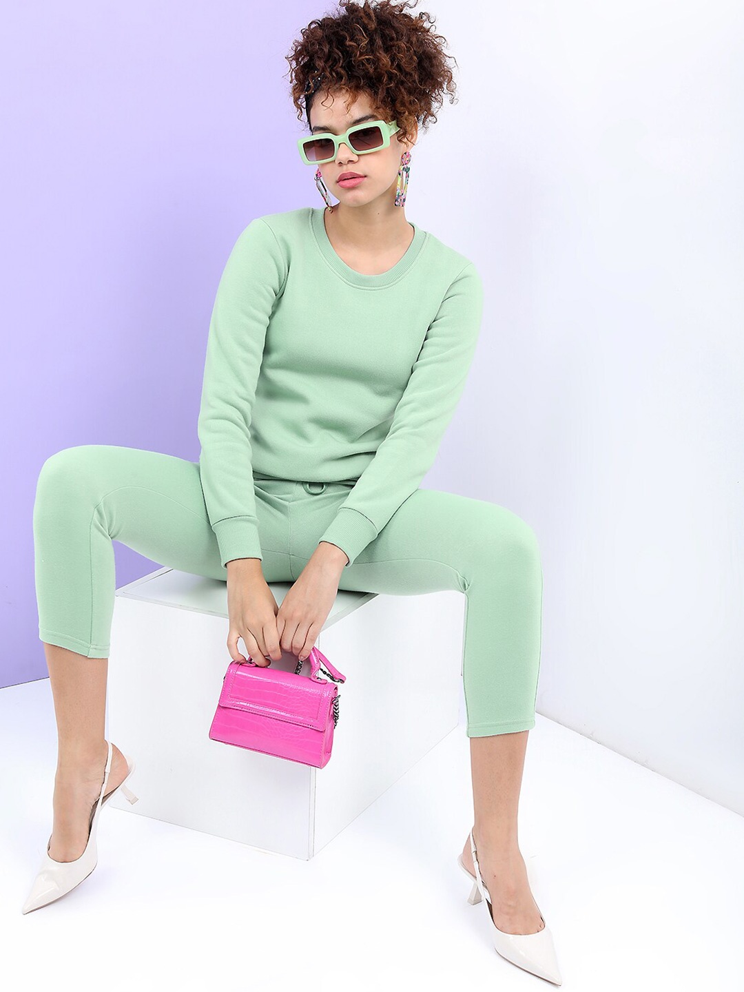 

Tokyo Talkies Women Sea Green Solid Round Neck Sweatshirt