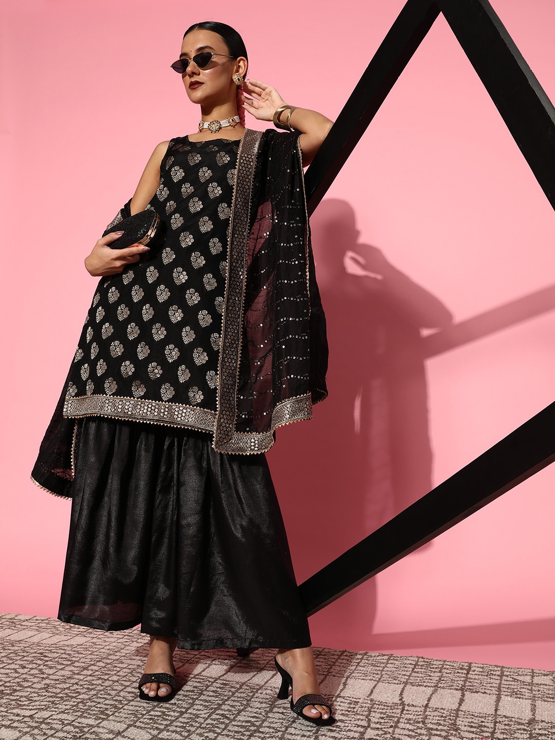 

Sunehri Women Black Brocade Gotta Patti A-Line Kurta with Sharara & With Dupatta