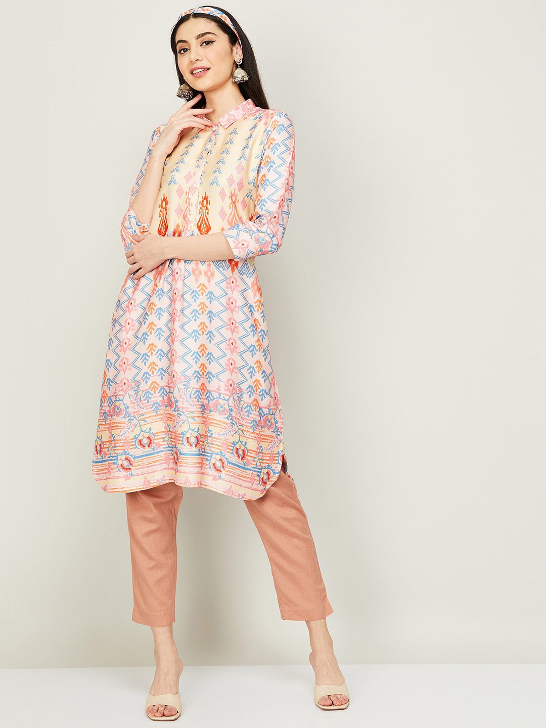 

Colour Me by Melange Women Pink & Cream Printed Shirt Collar Viscose Rayon Tunic