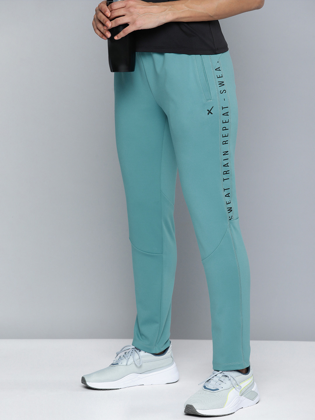 

HRX By Hrithik Roshan Women Teal-Green Typography Print Rapid-Dry Track Pants
