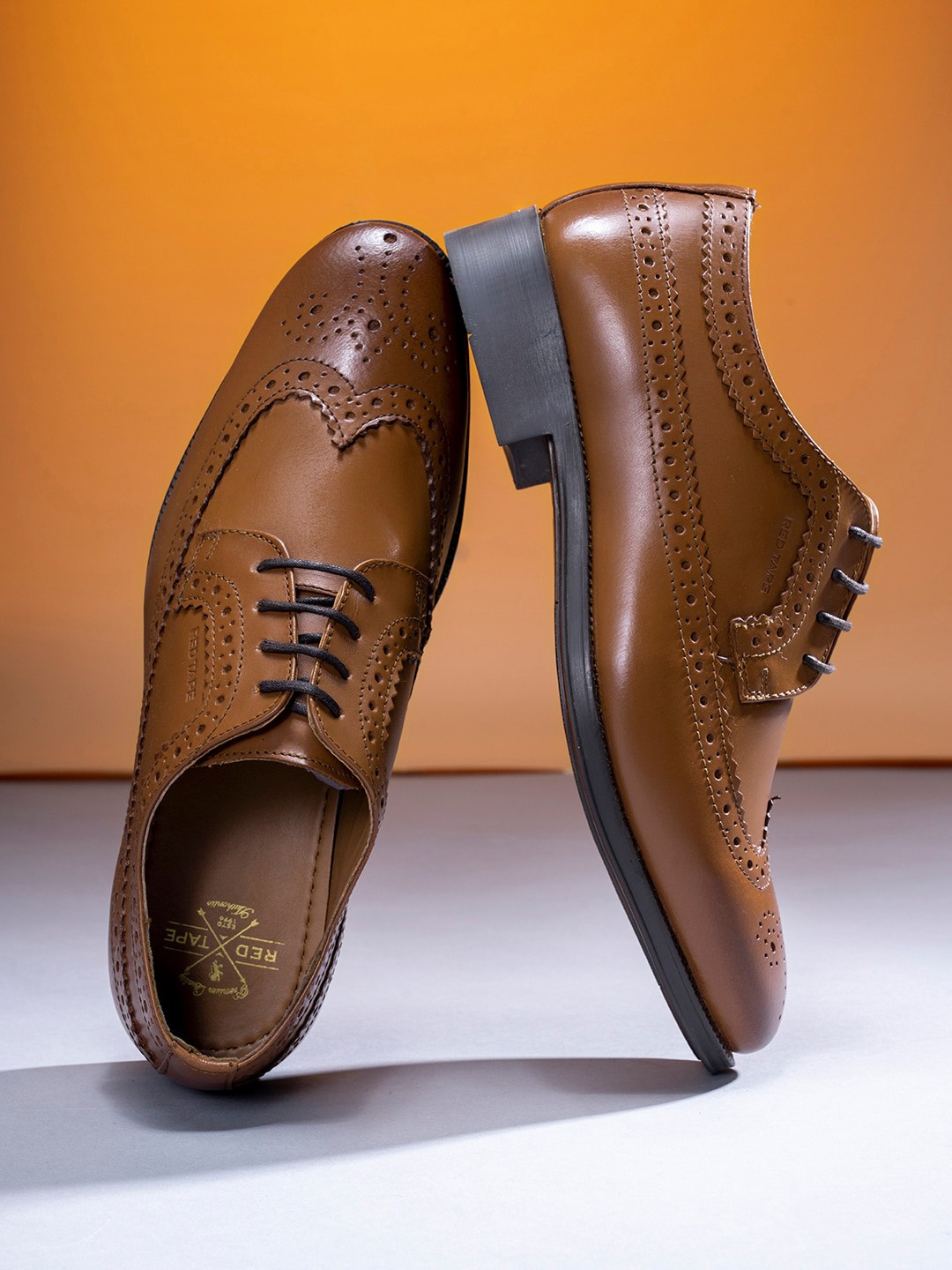 

Red Tape Men Tan Colored Solid Formal Brogues