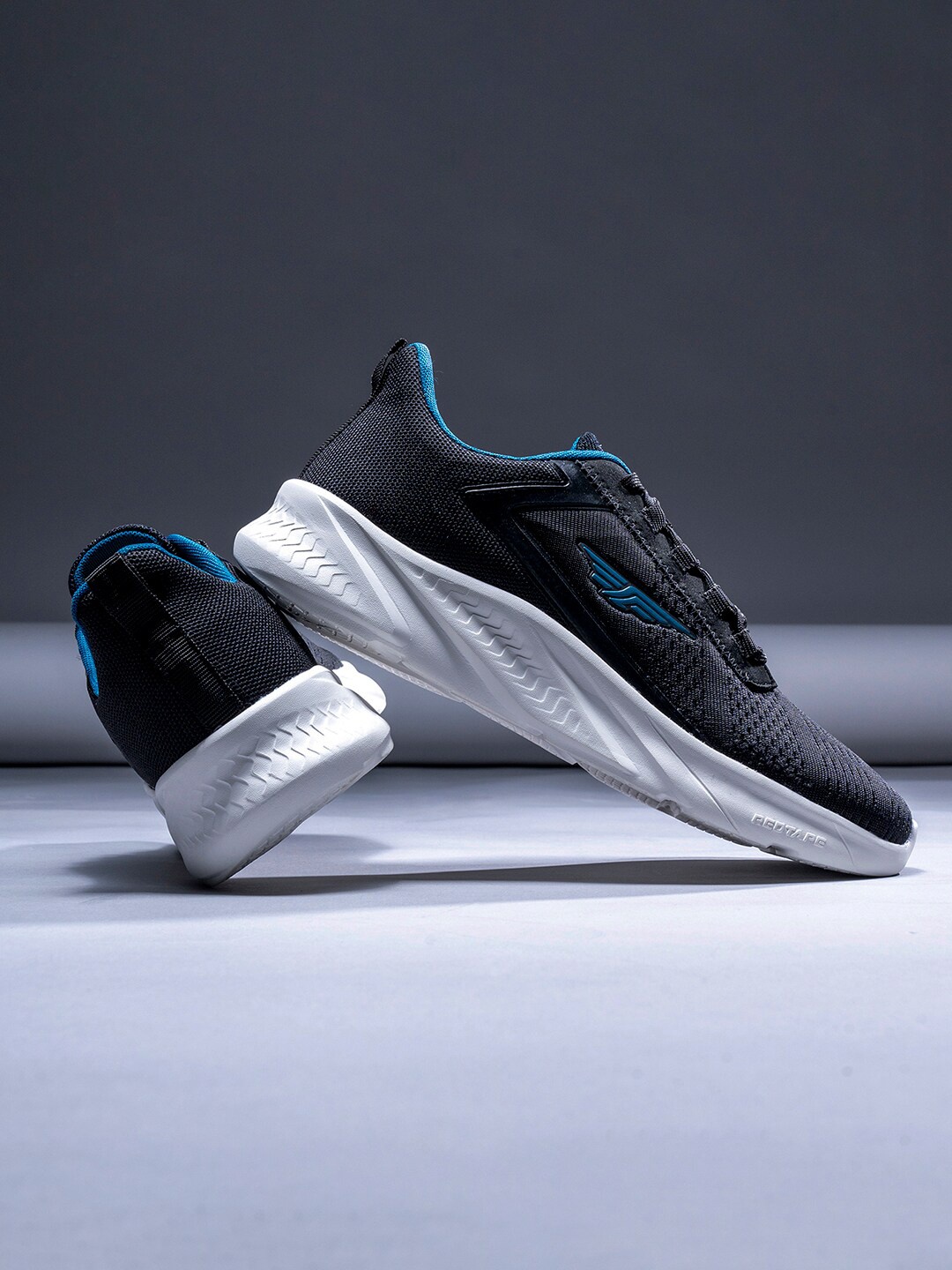 

Red Tape Men Black Textile Running Shoes