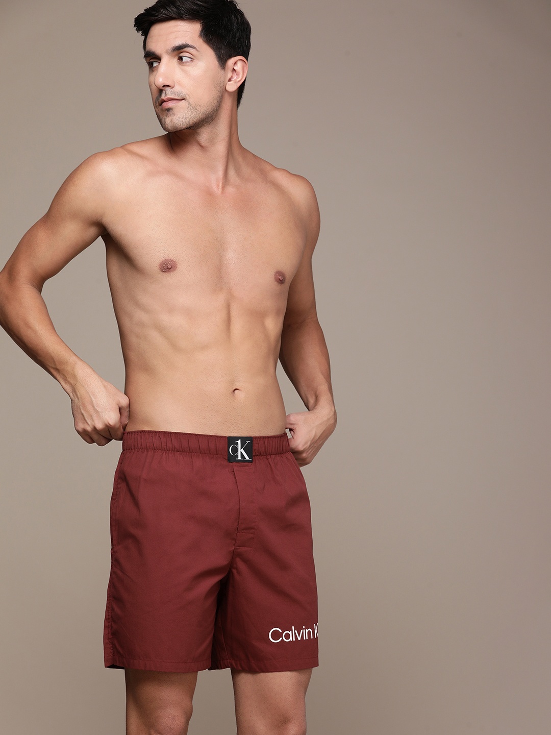 

Calvin Klein Underwear Men Brand Logo Printed Pure Cotton Boxer, Rust