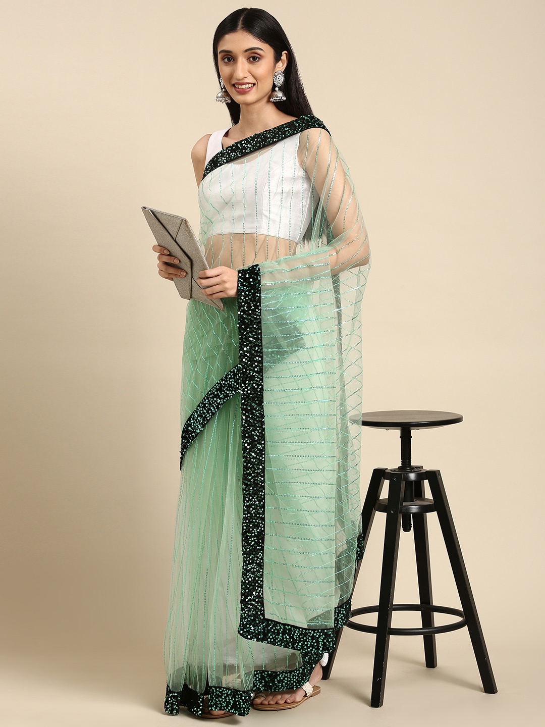 

Anouk Green Sequinned Net Saree