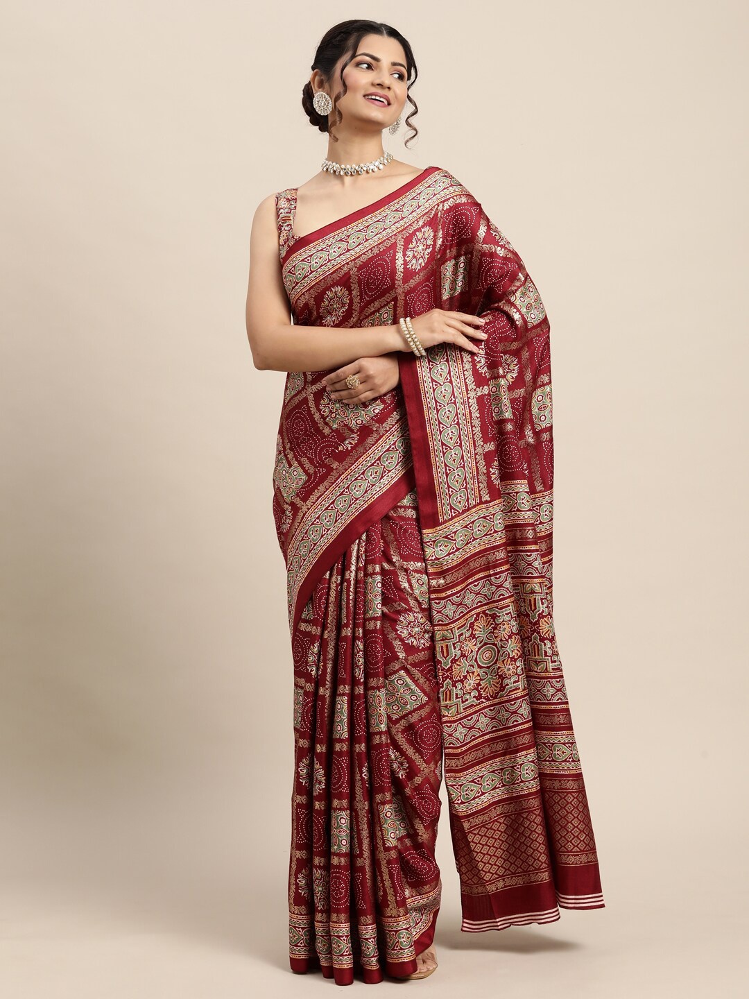 

Saree mall Maroon & Green Ethnic Motifs Bandhani Saree