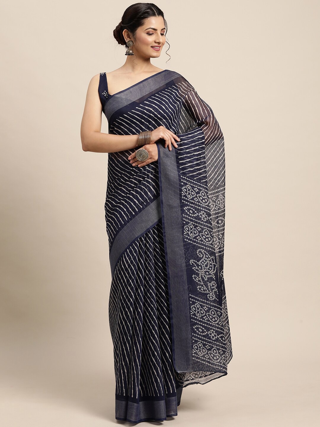 

Saree mall Navy Blue & White Leheriya Sarees
