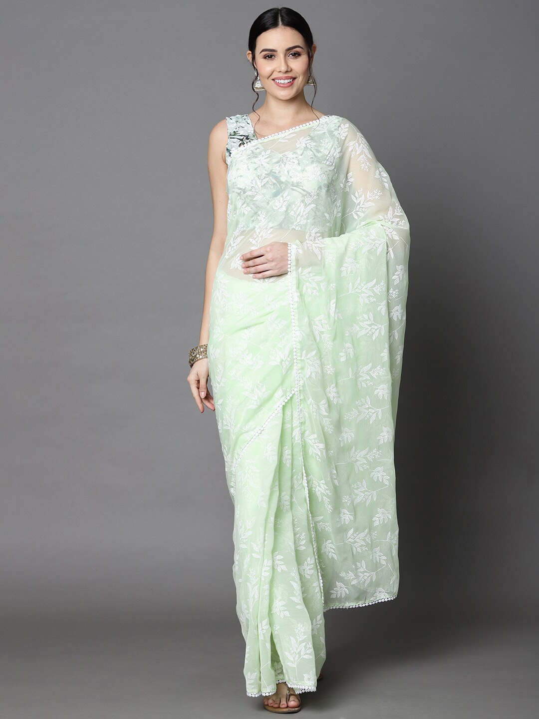 

Rajesh Silk Mills Lime Green & White Floral Pure Chiffon Saree