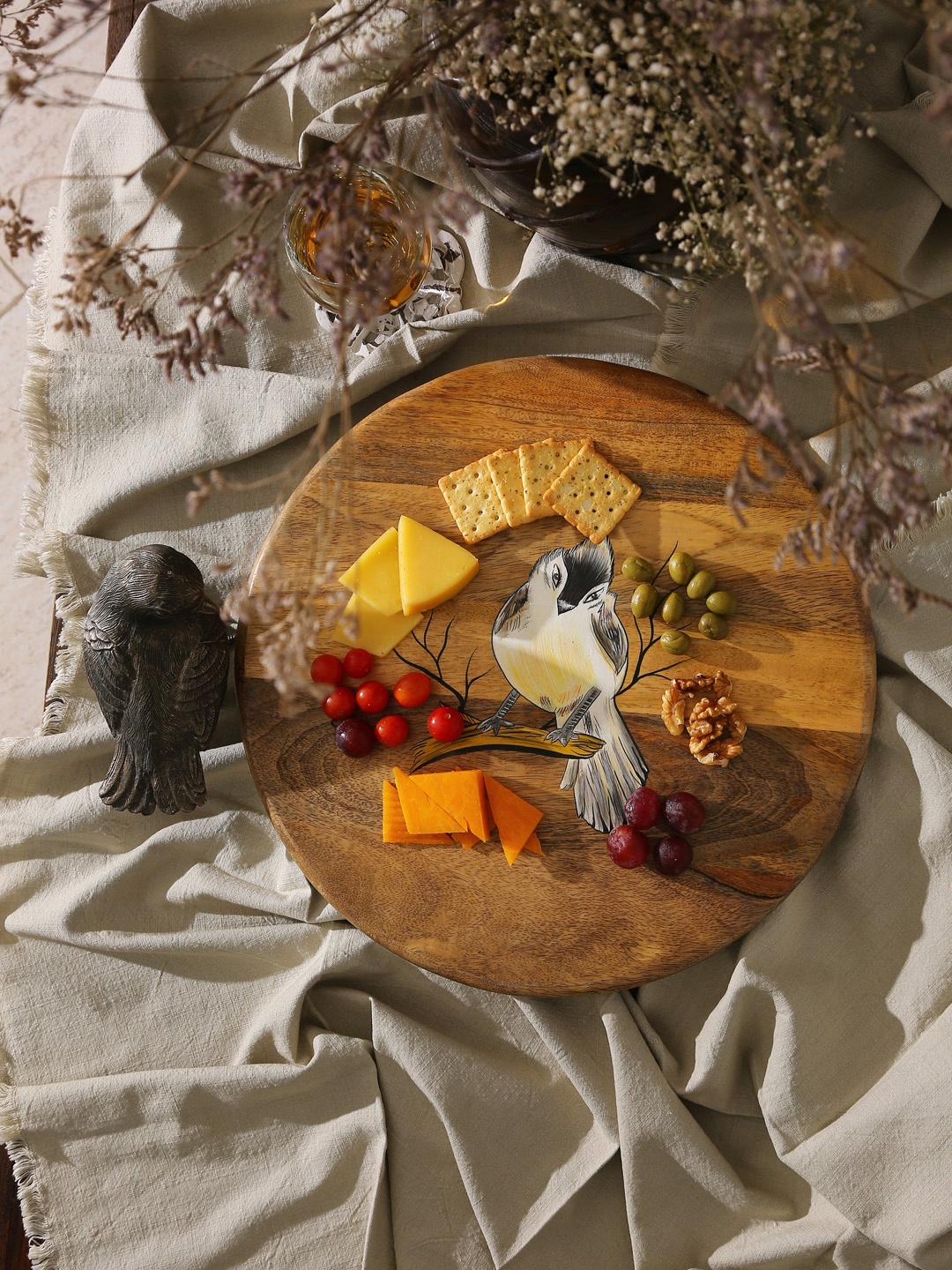 

Amoliconcepts Brown Textured Food Platter in Mango wood